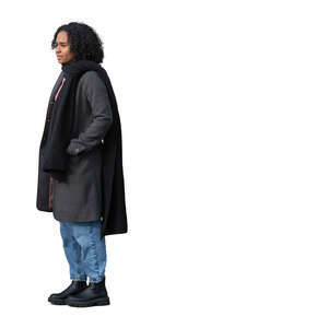 cut out woman in a black overcoat standing