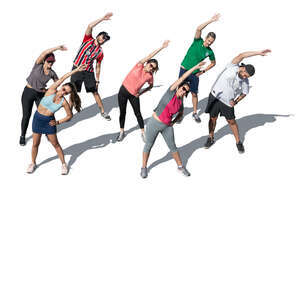 group of people exercising outside