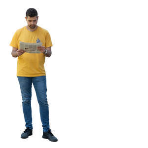 man standing and reading a newspaper