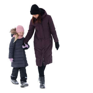 cut out woman and child walking hand in hand on a winter day