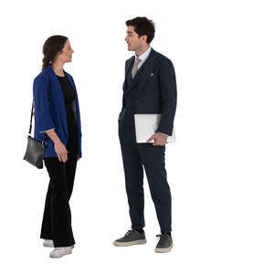 man and woman standing and discussing business matters