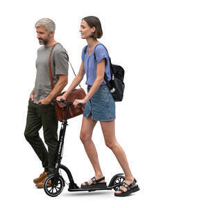 man walking side by side with a woman riding a scooter 