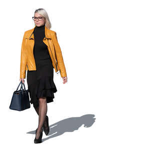 woman with a yellow jacket walking