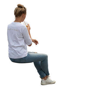 woman sitting and drinking juice