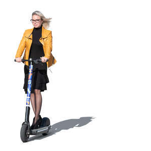 cut out backlit woman in a dress riding a scooter