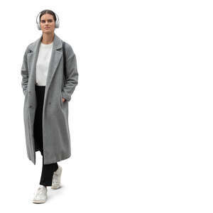 cut out woman in a grey woolen overcoat walking