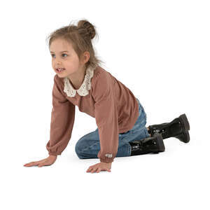 cut out little girl sitting on the floor and playing