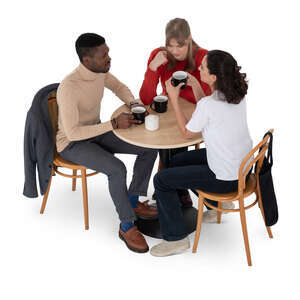 top view of a group of friends sitting in a coffeeshop