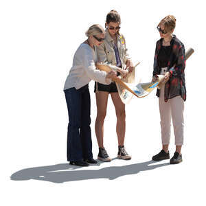 cut out backlit group of women looking at some project papers