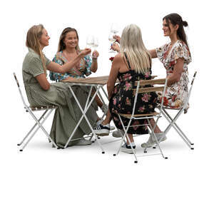 cut out group of women drinking wine in a restaurant