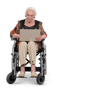 elderly lady sitting in a wheelchair and holding a laptop