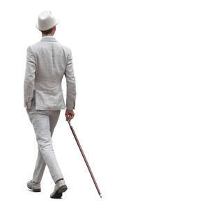 man in a white suit wearing a hat and holding a walking stick walking