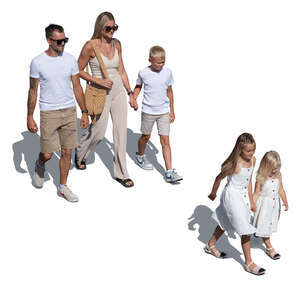 top view of a family with three kids walking 