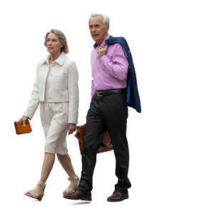 two older people in formal clothing walking