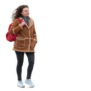 woman with a brown leather jacket walking