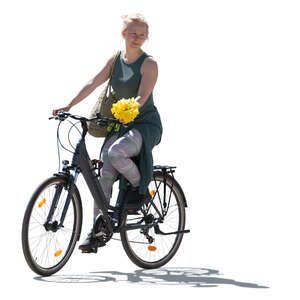 cut out backlit woman holding flowers riding a bike