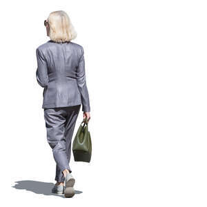 middle aged businesswoman walking