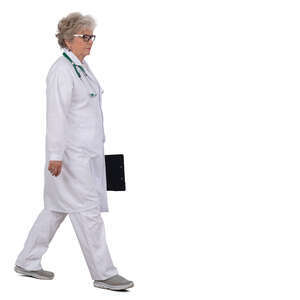 grey haired doctor walking