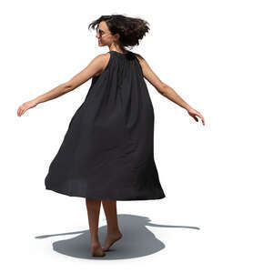 cut out woman in a black dress twirling