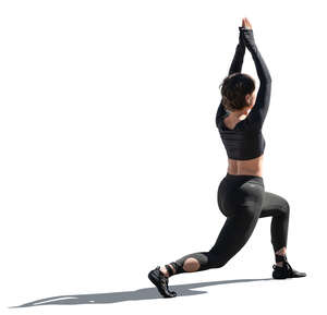 cut out backlit woman doing yoga exercises