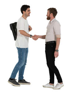 two men greeting each other with a handshake