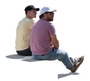 two casual backlit men sitting