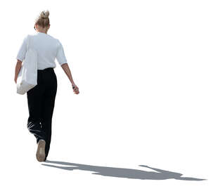 backlit woman walking