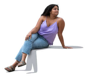 young black woman sitting casually in the sun