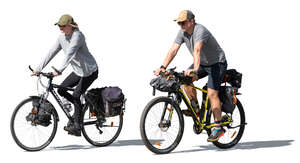 two people traveling on bikes