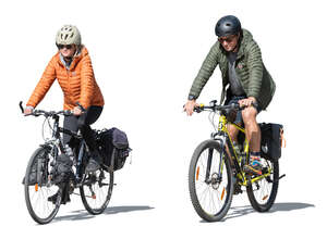 two sporty bikers travelling on bicycles