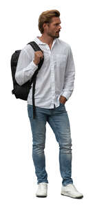 young man in jeans and holding a backpack standing