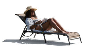 backlit black woman relaxing on the beach chair by the pool