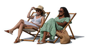 two resort style women relaxing in garden chairs