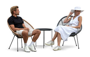 cut out man and woman sitting in lounge chairs