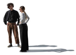 cut out sidelit man and woman standing and talking