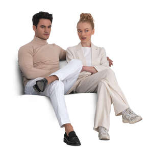 cut out elegant couple sitting on the sofa