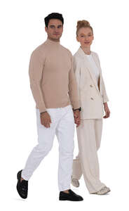 cut out elegant couple walking hand in hand