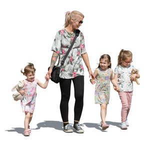 woman with three little girls walking hand in hand