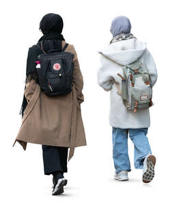 two muslim women in autumn walking