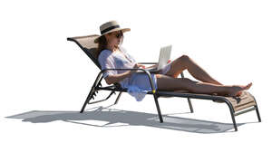 backlit woman lying in a chaise lounge chair