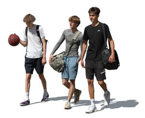 three boys with basketball walking