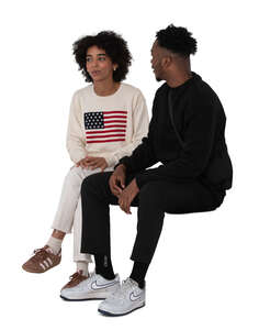 black man and woman sitting and talking