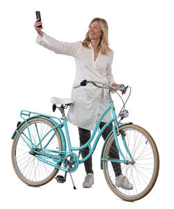 woman with a bicycle taking a selfie