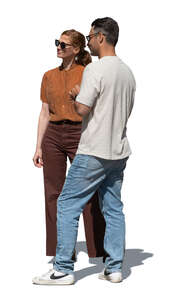 man and woman standing outside