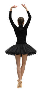 ballerina in a black tutu dress dancing