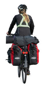 woman riding a travel bike with many bags