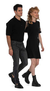 cut out couple in black walking