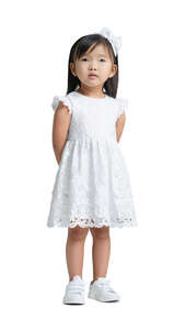 little asian girl in a white party dress standing