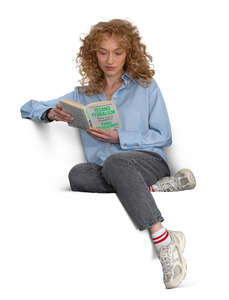 cut out woman sitting on a sofa and reading a book