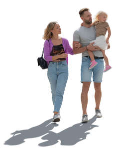 cut out backlit family with a little girl walking